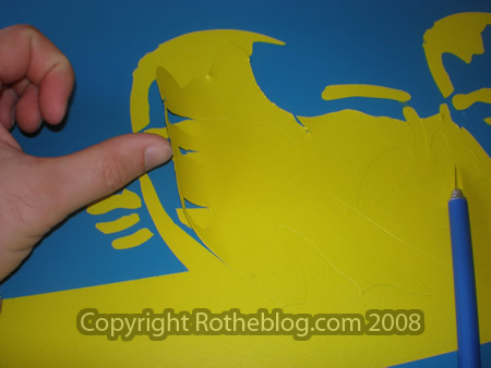 Removing some of the stencil after cutting