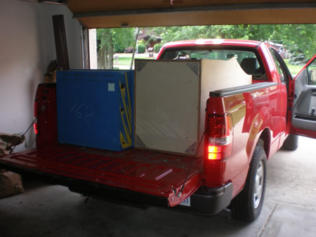 Packing up truck - Pac-man cabinet and Flight 2000 Pinball